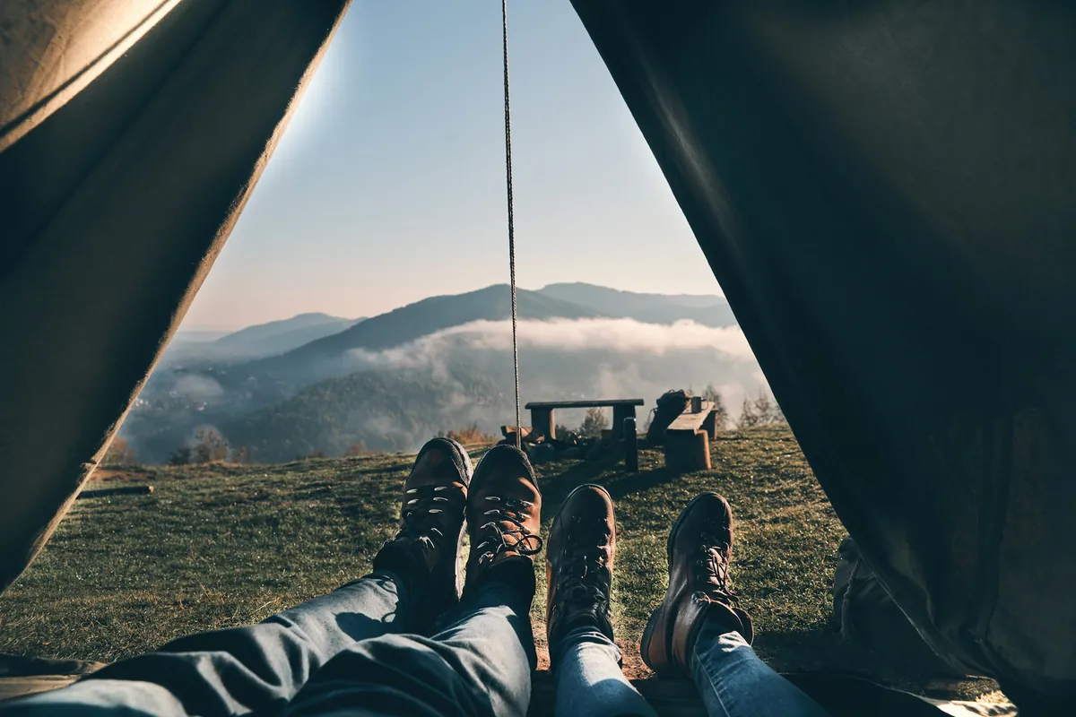 Couple camping together in nature