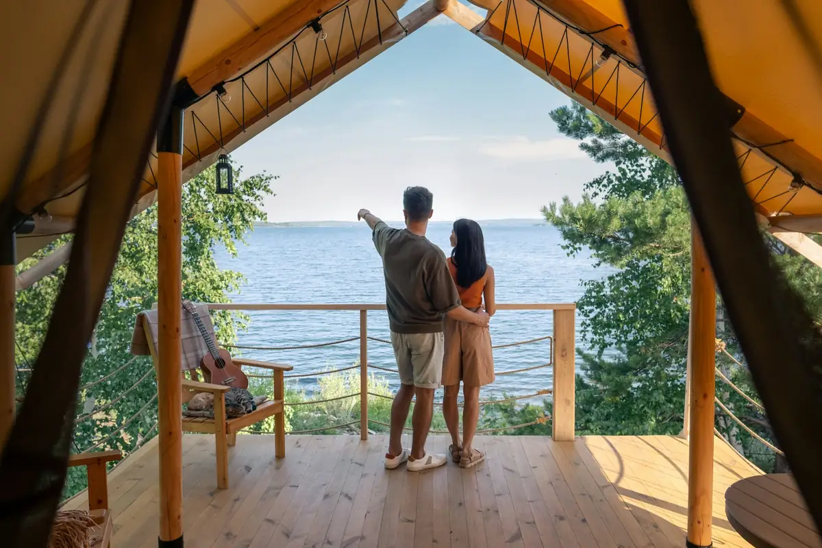 Couple relaxing at a cabin in nature