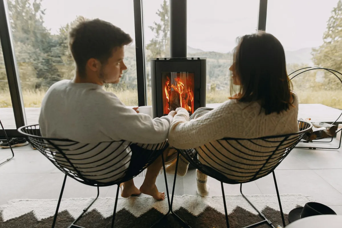 Couple relaxing at a cabin in nature