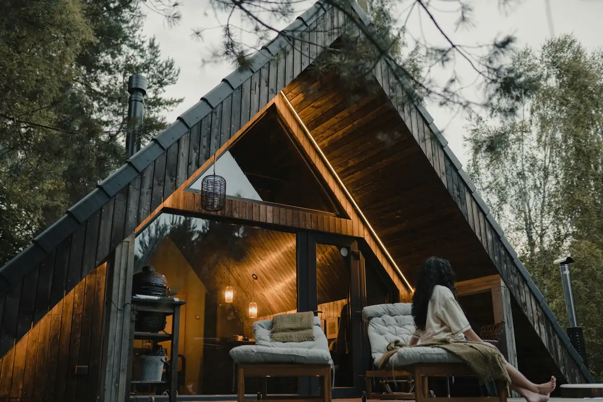 Couple relaxing at a cabin in nature