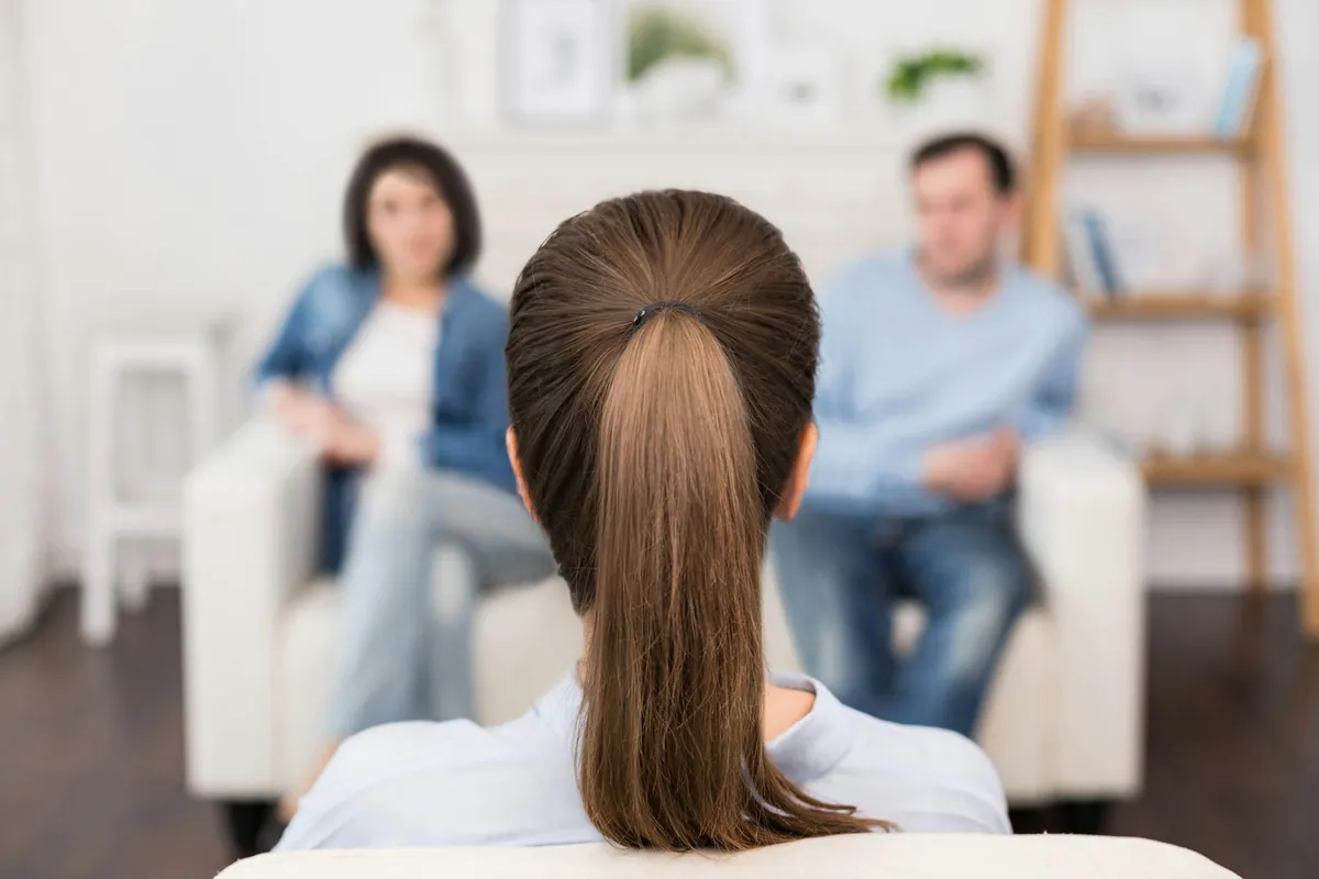 Couple talking with a therapist