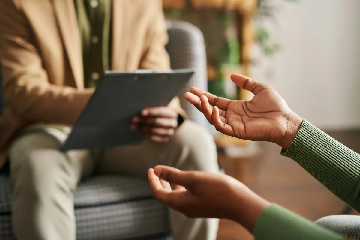 Couple talking with a therapist