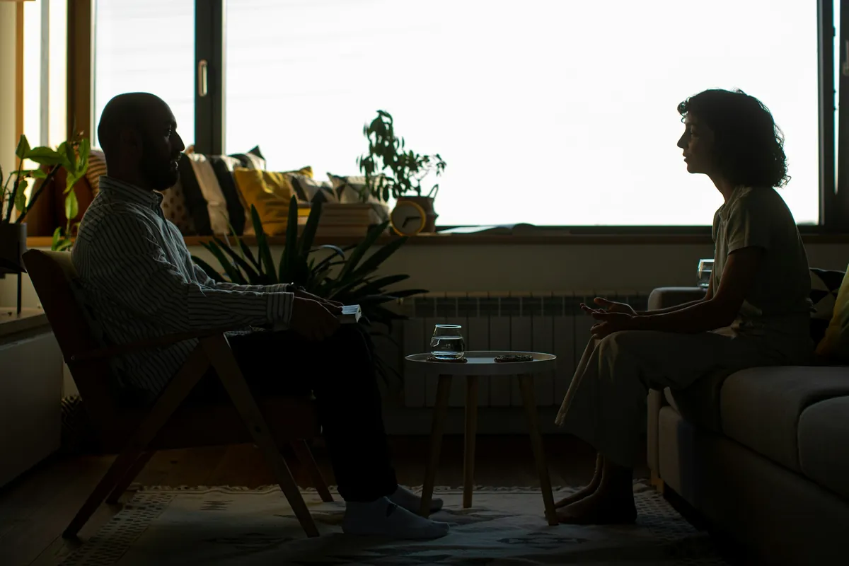 Couple talking with a therapist