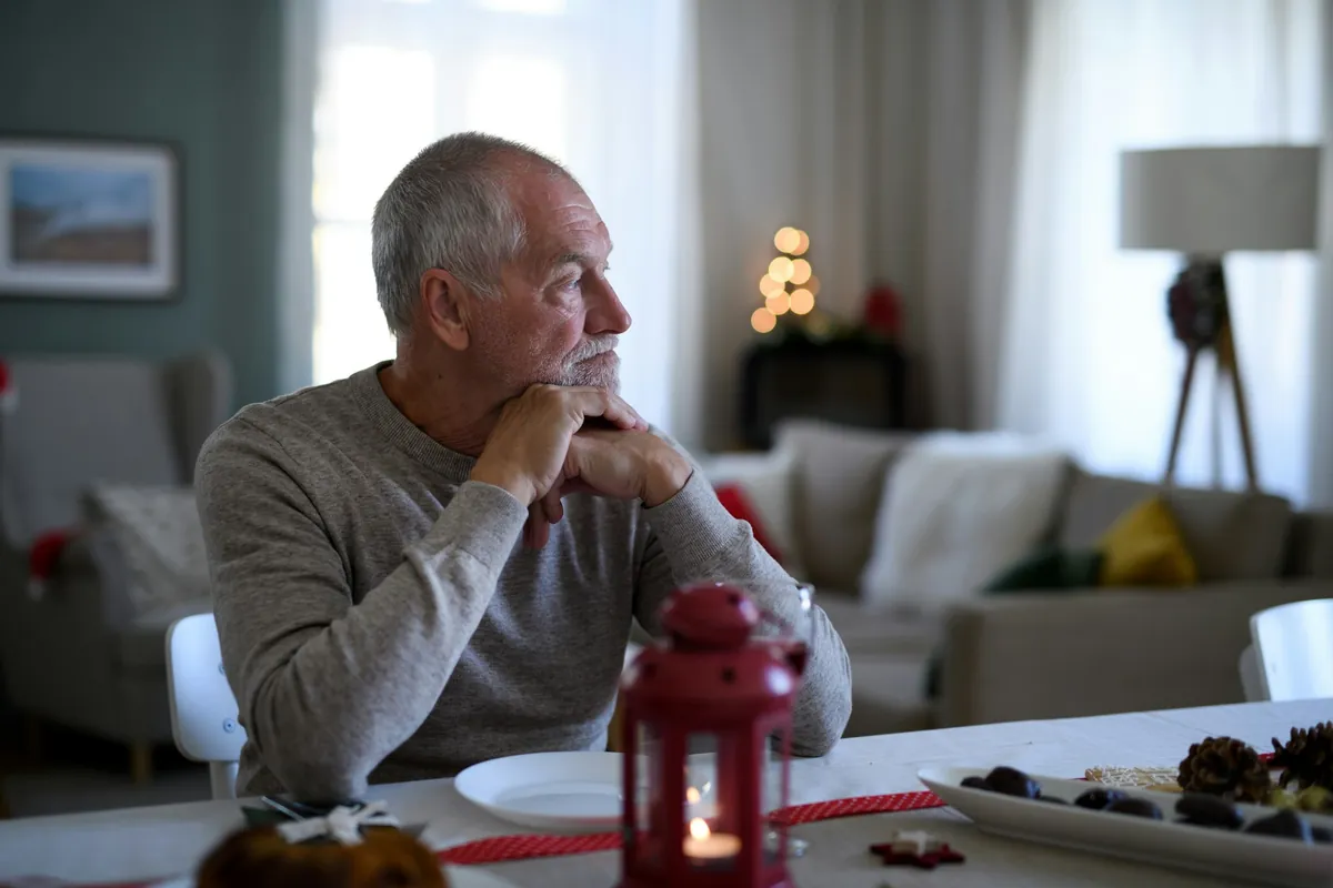 Man sitting alone, deep in thought
