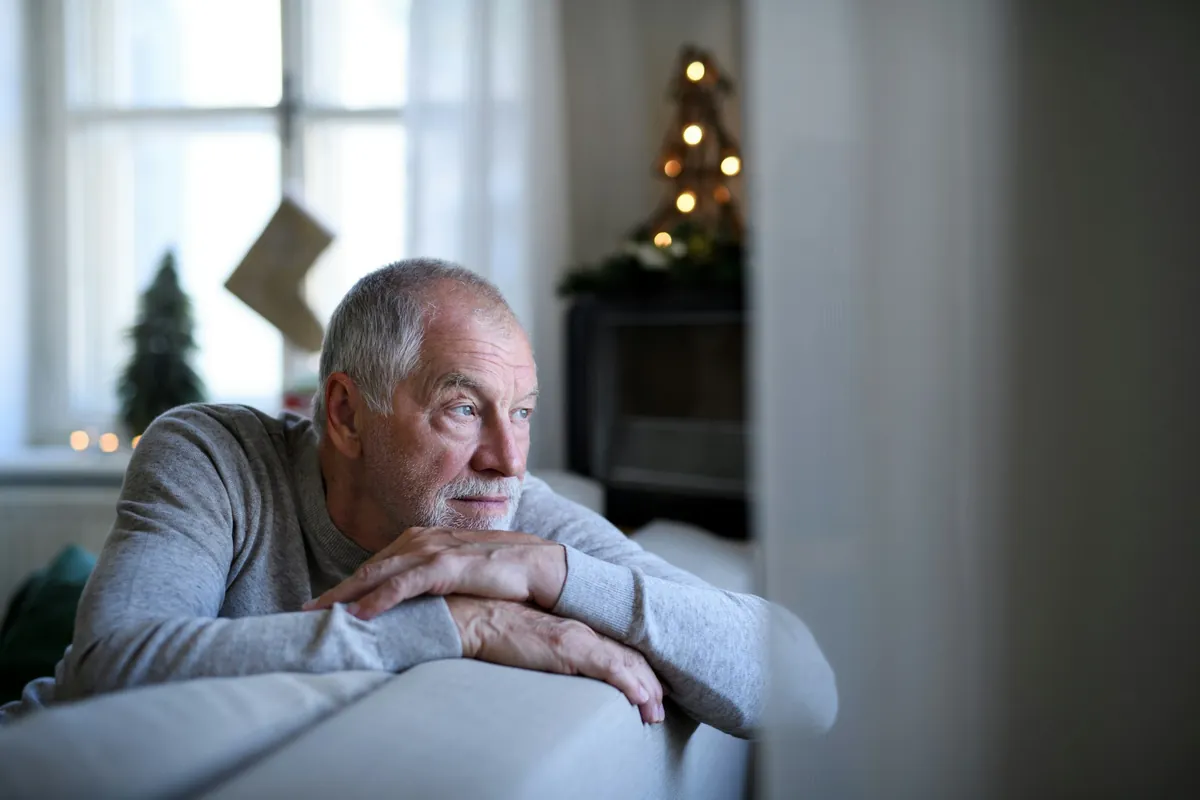 Man sitting alone, deep in thought