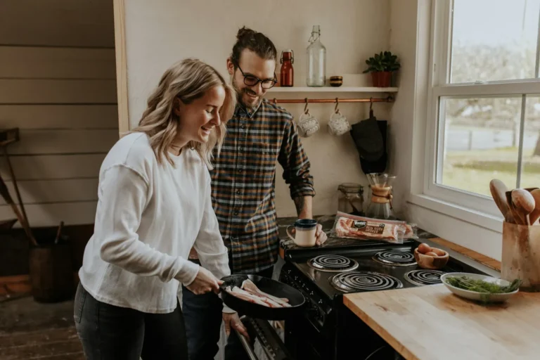 Couple cooking together in the kitchen