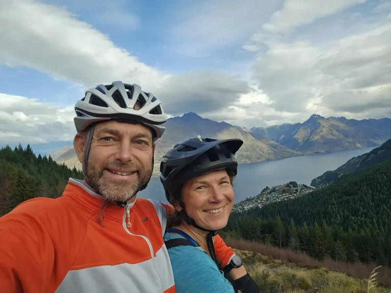 Mark and Tarisha mountain biking above Queenstown