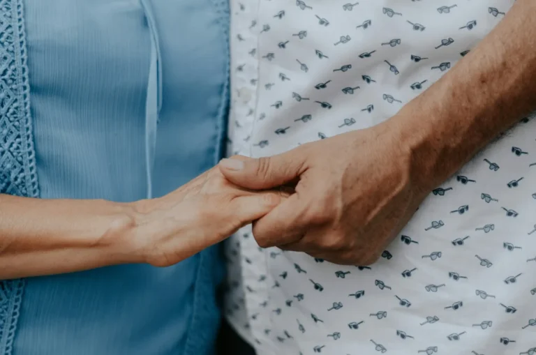 Long-term couple holding hands
